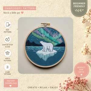 Main preview of arctic wildlife nature inspired hand embroidery pattern showing bear, sky, and nature in a hand stitched hoop art design