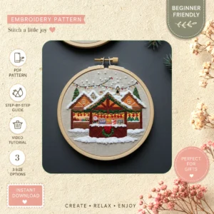 Main preview of winter cottage snowy christmas hand embroidery pattern showing cottage in a hand stitched hoop art design