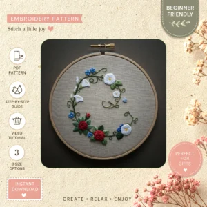 Main preview of woodland wreath flowered branches hand embroidery pattern showing flowers, leaves, wreath, woodland, and nature in a hand stitched hoop art design